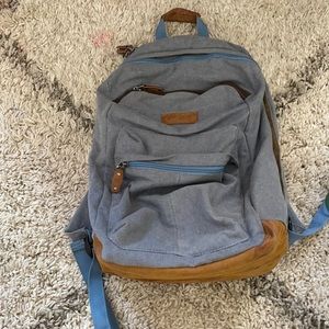 Never used backpack- suade and eco-friendly company